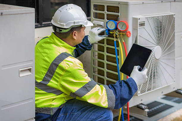 Professional Heat Pump Repair technician working in Marlborough, MO